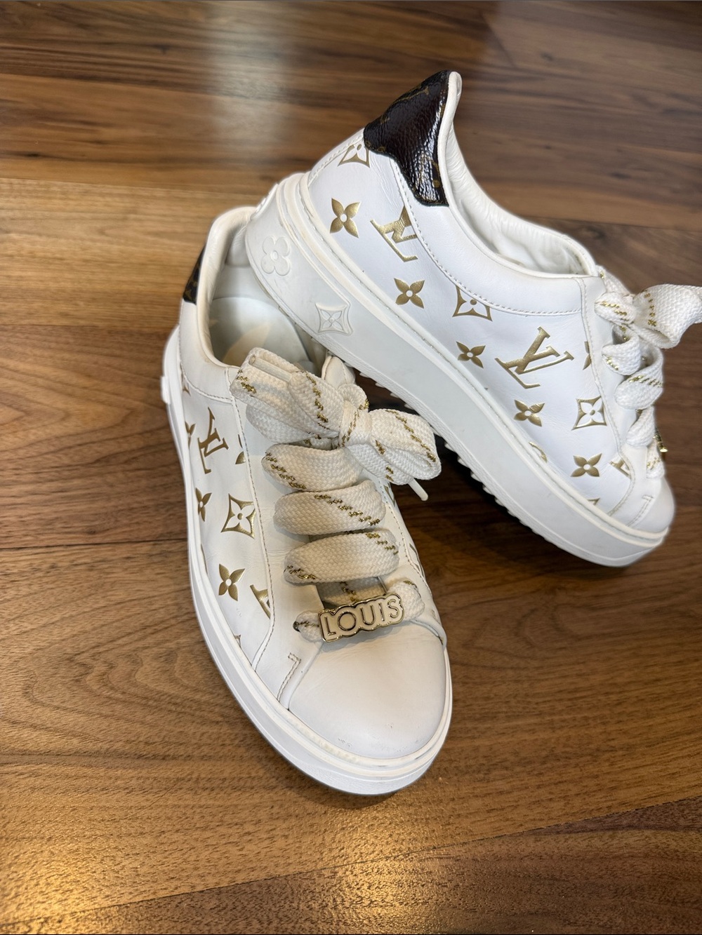 Louis Vuitton White Sneakers with Gold Monogram Accents